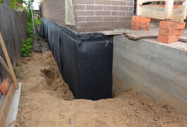 Happy homeowners after waterproofing job in Morton Grove
